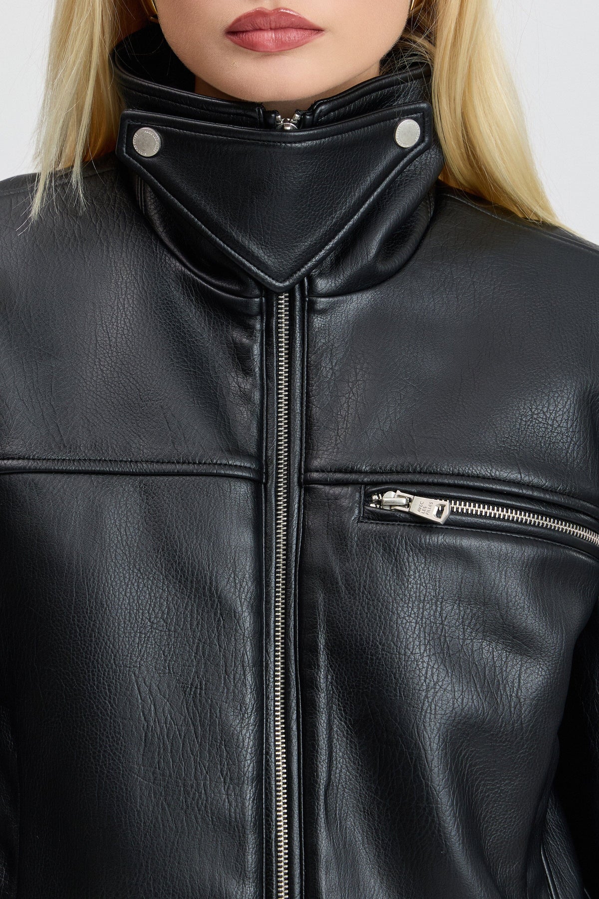 Black cropped jacket with a high stand collar and a front zipper. Shop women's cute cropped jackets by Avec Les Filles.
