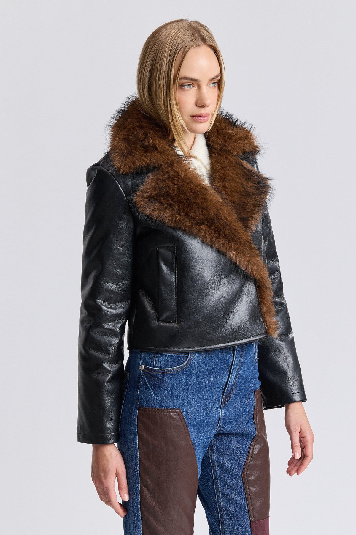 Black cropped jacket with snap-front and long sleeves - Shop women's faux leather jackets by Avec Les Filles.