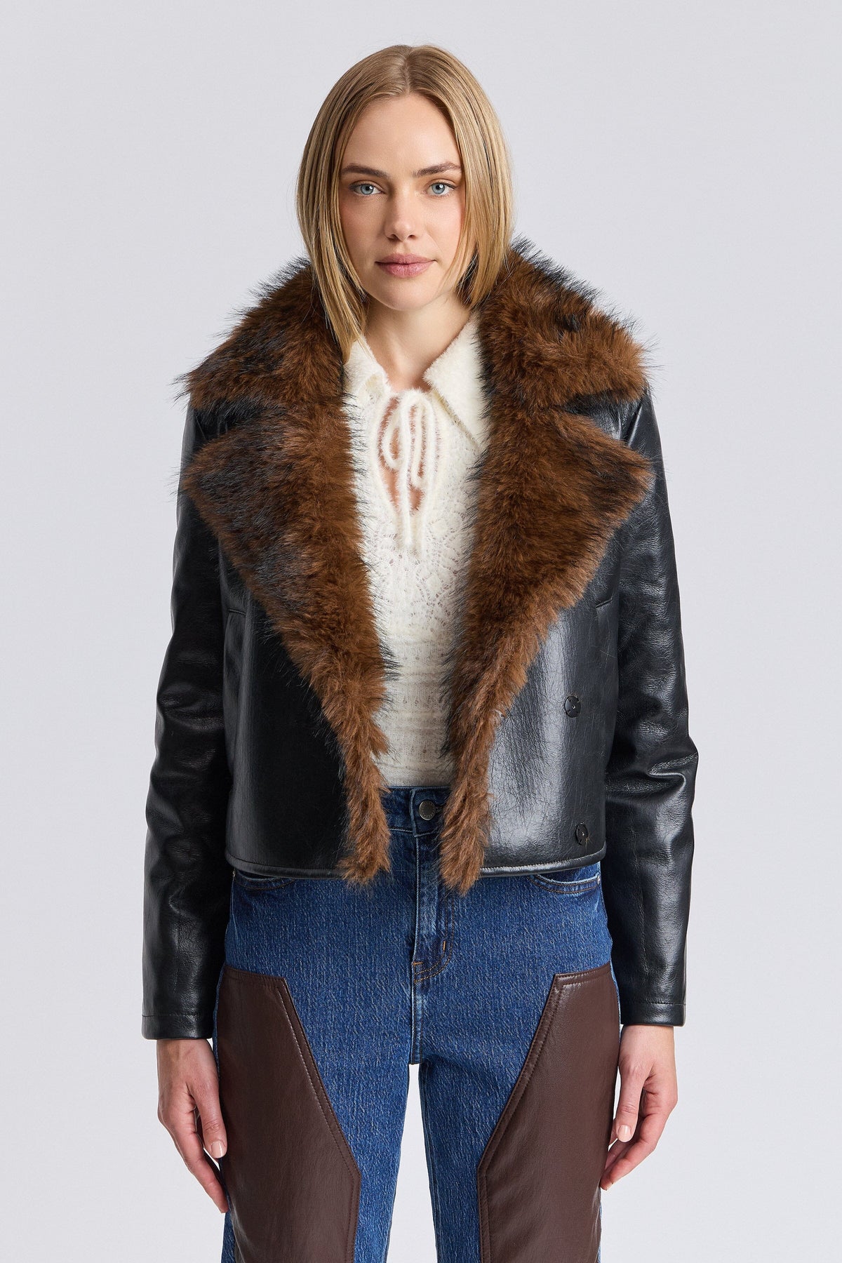 Black cropped faux leather jacket with snap-front and long sleeves - Shop women's jackets by Avec Les Filles.