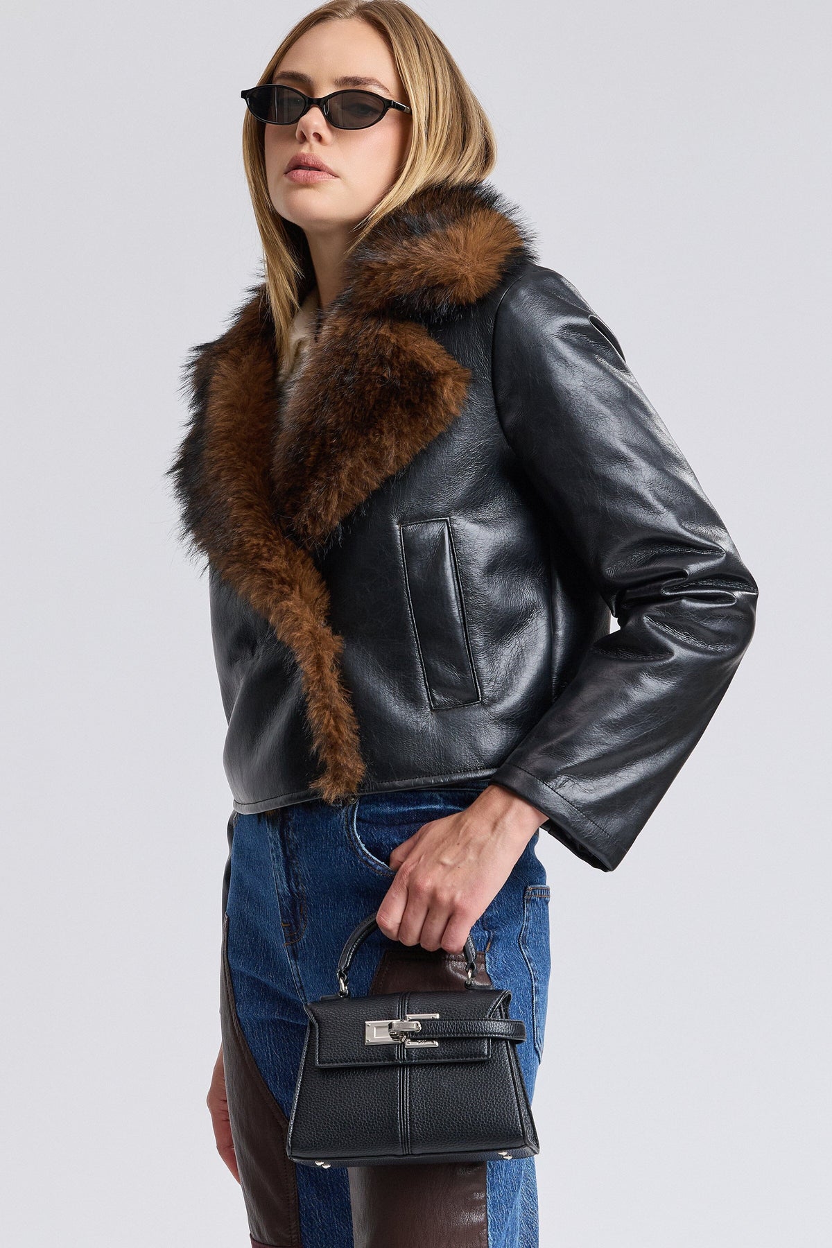 Black cropped faux leather jacket with long sleeves - Shop women's faux leather jackets by Avec Les Filles.