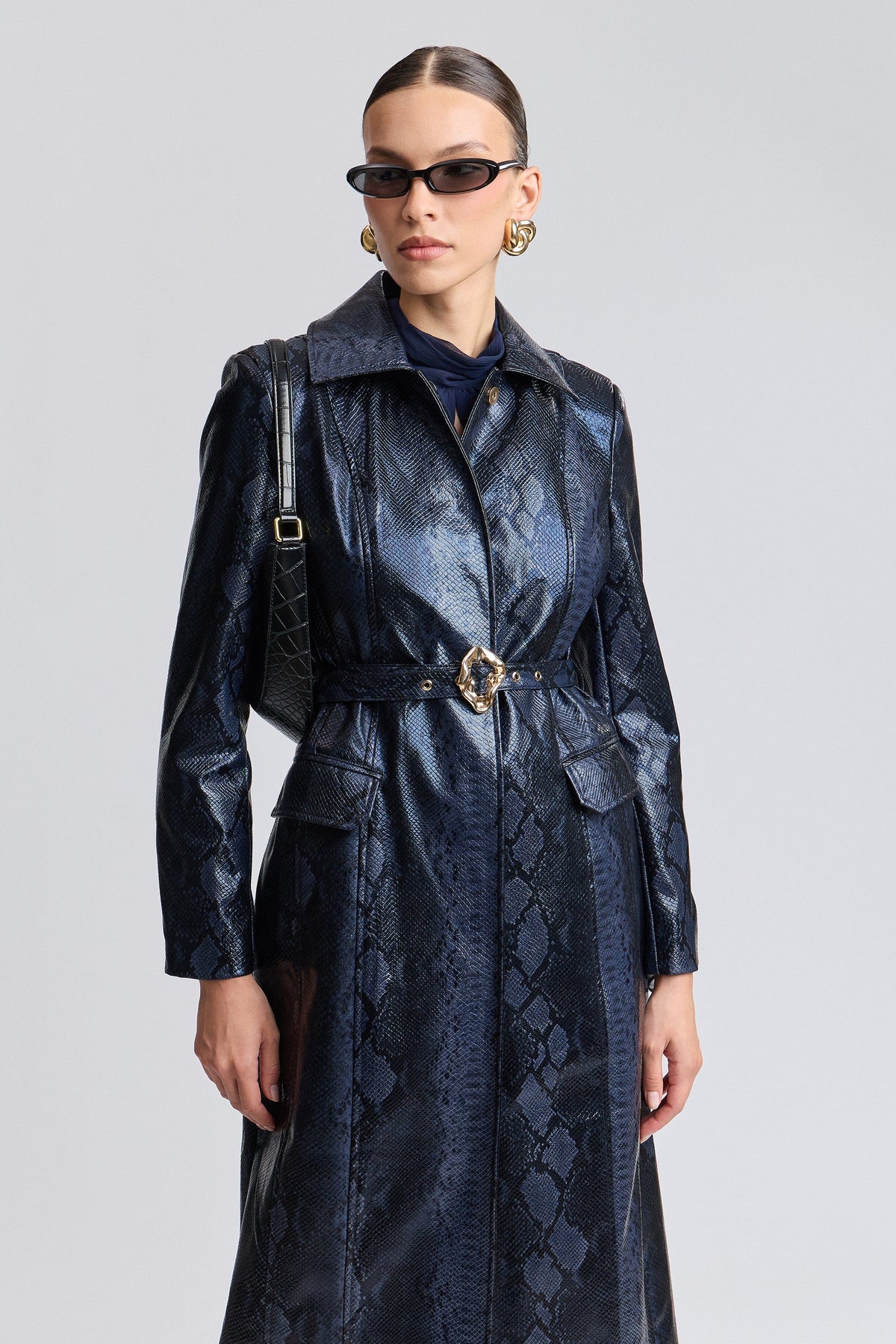 Navy long faux leather trench coat with long sleeves and belt - Shop designer trench coats by Avec Les Filles.