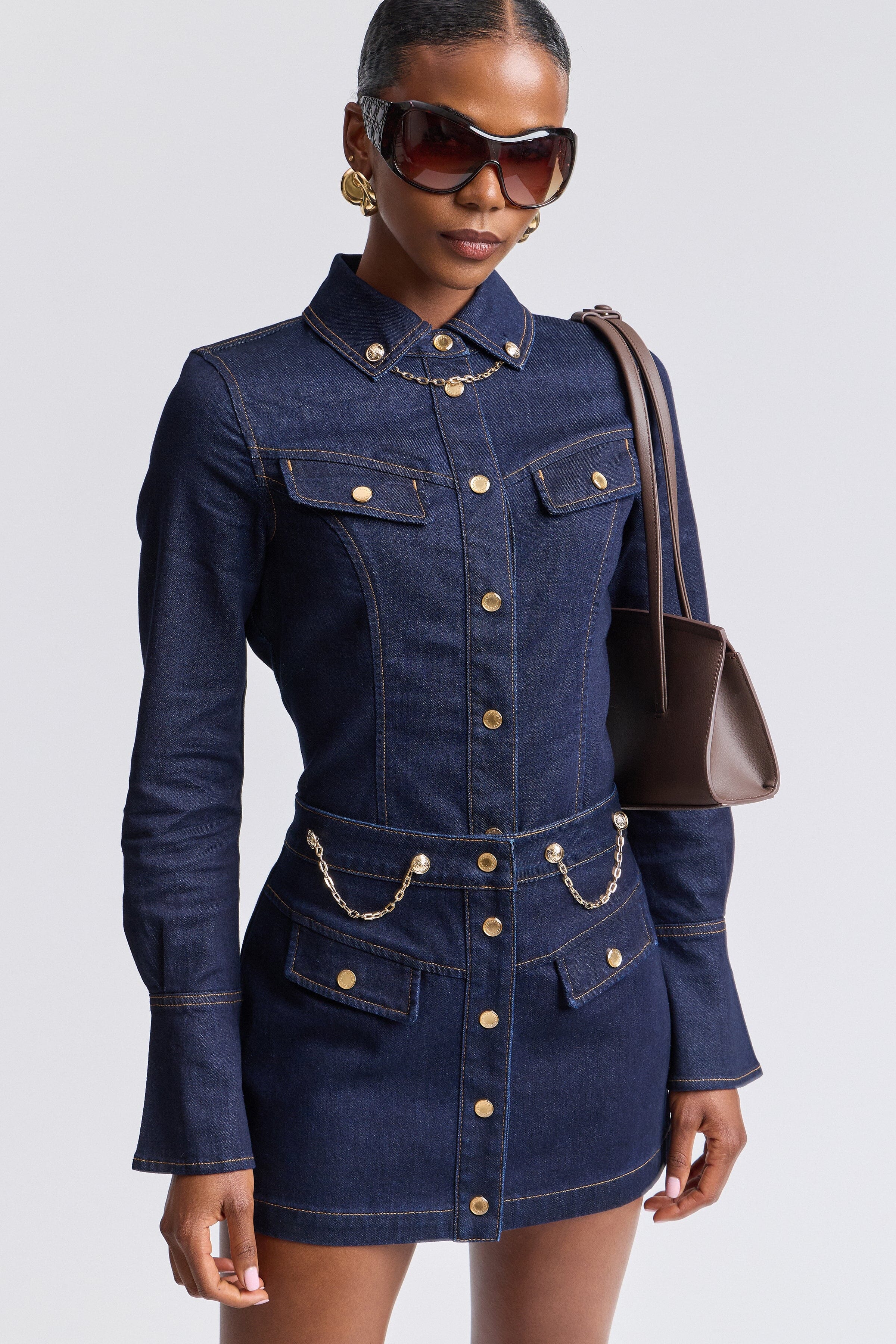 Dark indigo jean mini skirt with high-rise and flap pockets - Shop women's denim mini skirts by Avec Les Filles.