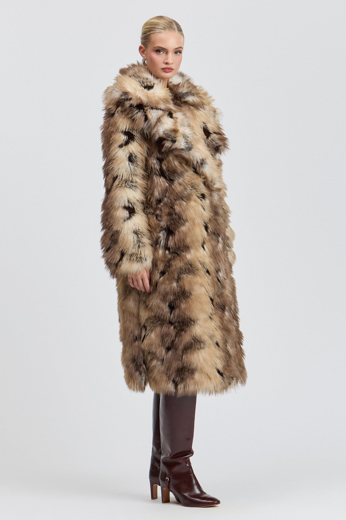 Brown faux fur full length coat with side slits and a wide collar. Shop women's cute tan fur coats by Avec Les Filles.