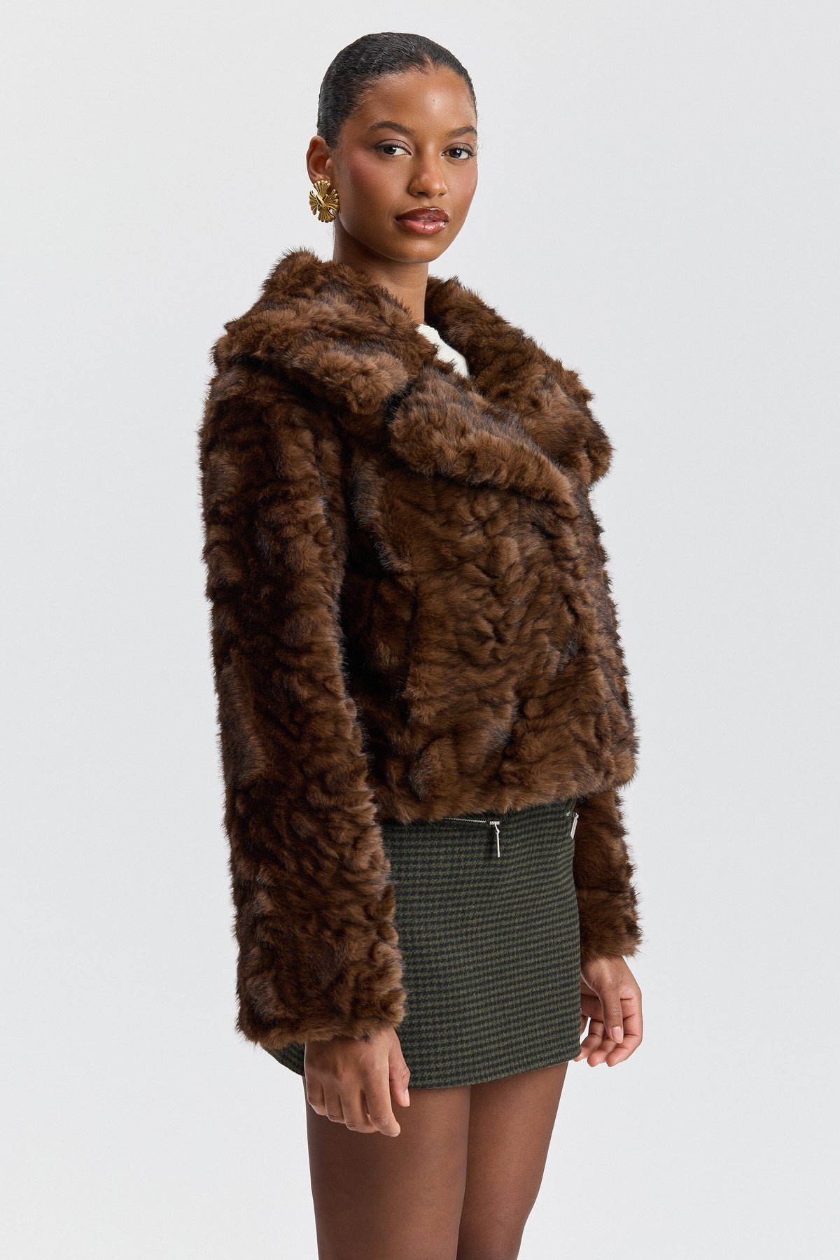 Faux brown fur jacket with a center-front and wide collar. Shop designer women's cute brown jackets by Avec Les Filles.