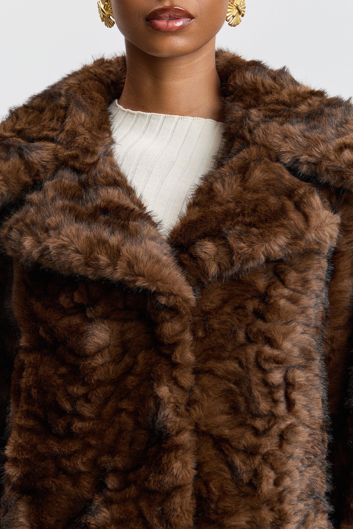 Brown faux fur jacket with a center-front and wide collar. Shop designer women's cute brown jackets by Avec Les Filles.