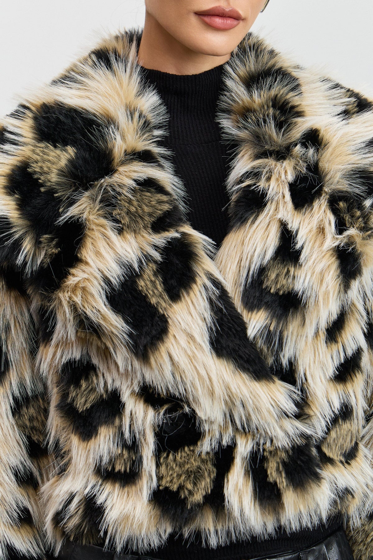 Faux fur double-breasted leopard jacket with a button front. Shop women's cute cropped jackets by Avec Les Filles.