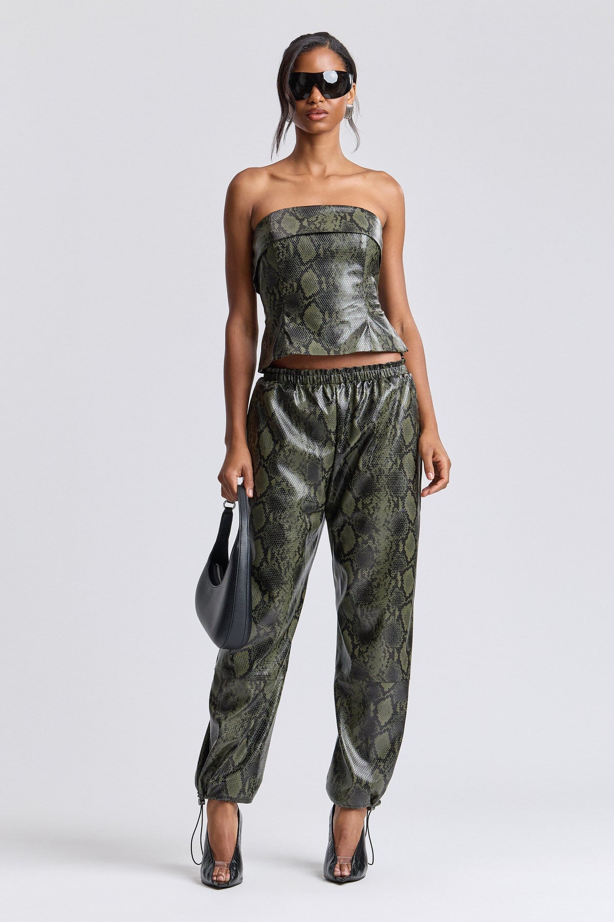 Green faux leather pants women with an elastic waist - Shop designer cute jogger pants by Avec Les Filles.