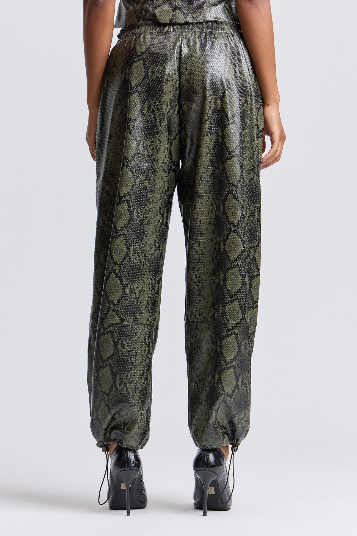 Green faux leather pants with an adjustable drawcord - Shop women's cute jogger pants by Avec Les Filles.