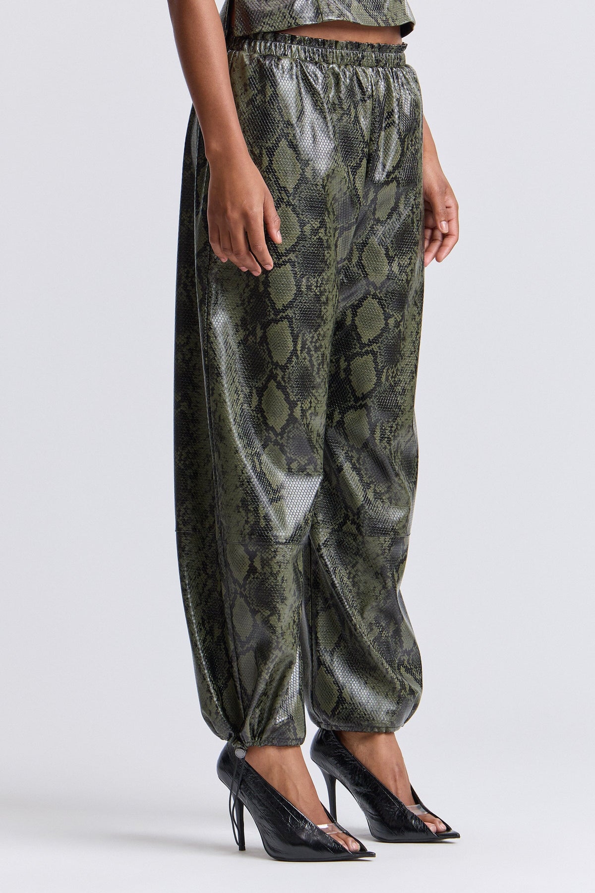 Green faux leather jogger pants with an elastic waist - Shop faux leather joggers for women by Avec Les Filles.