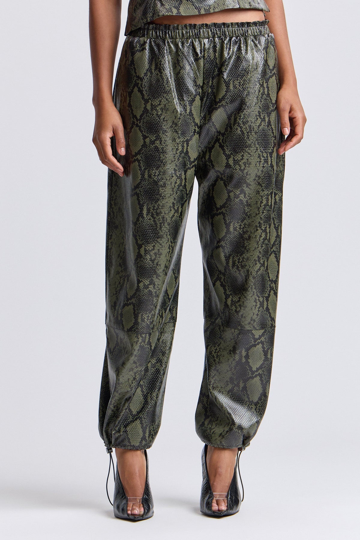 Green faux leather joggers with an elastic waist - Shop designer women's cute jogger pants by Avec Les Filles.