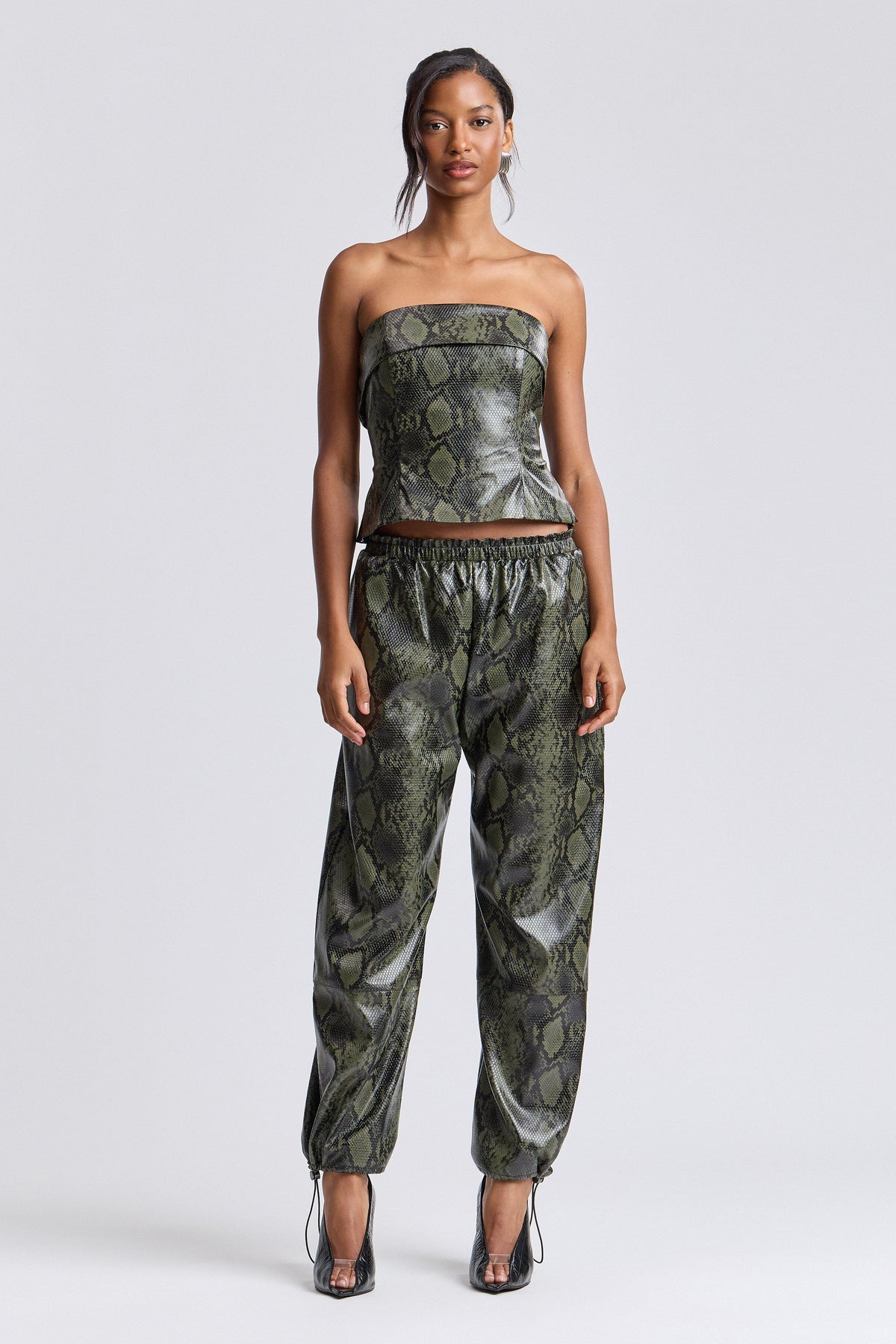 Green faux leather jogger pants with an elastic waist - Shop designer women's cute jogger pants by Avec Les Filles.