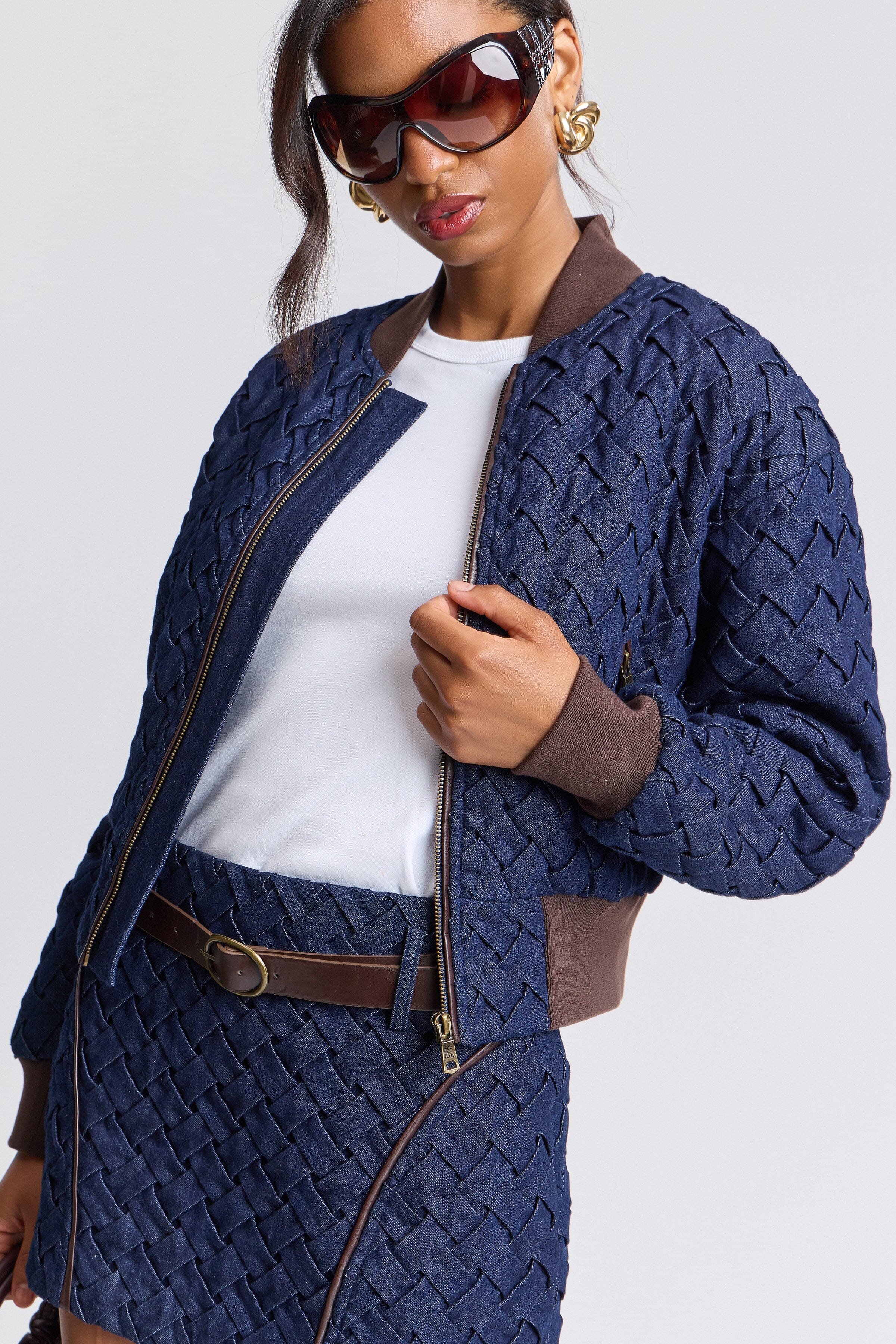 Woven indigo blue bomber jacket denim with zip-front and long blouson sleeves - Shop bomber jackets by Avec Les Filles. 