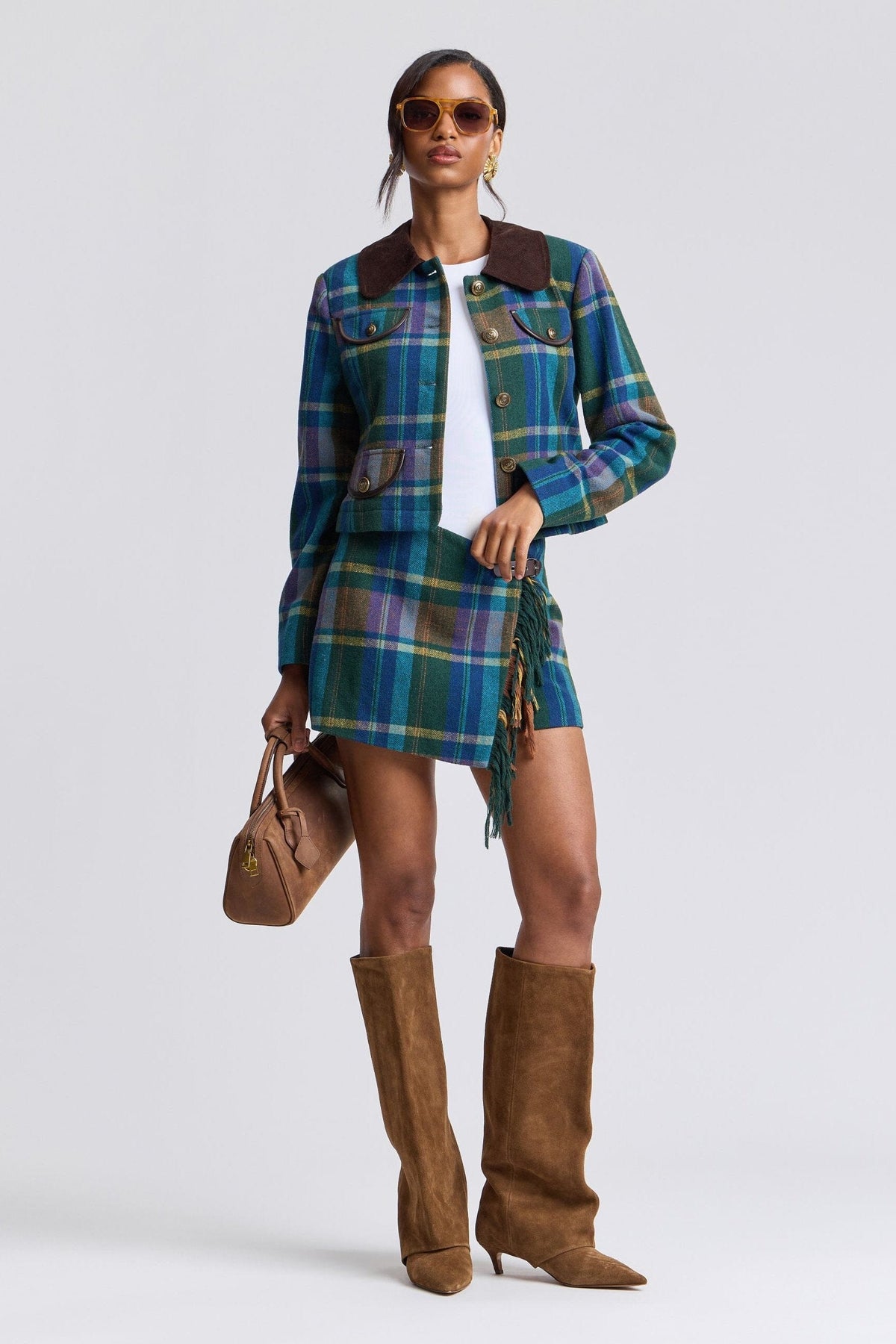 Asymmetrical waist green multi plaid mini skirt with a wrap front - Shop designer plaid skirts for women by Avec Les Filles.