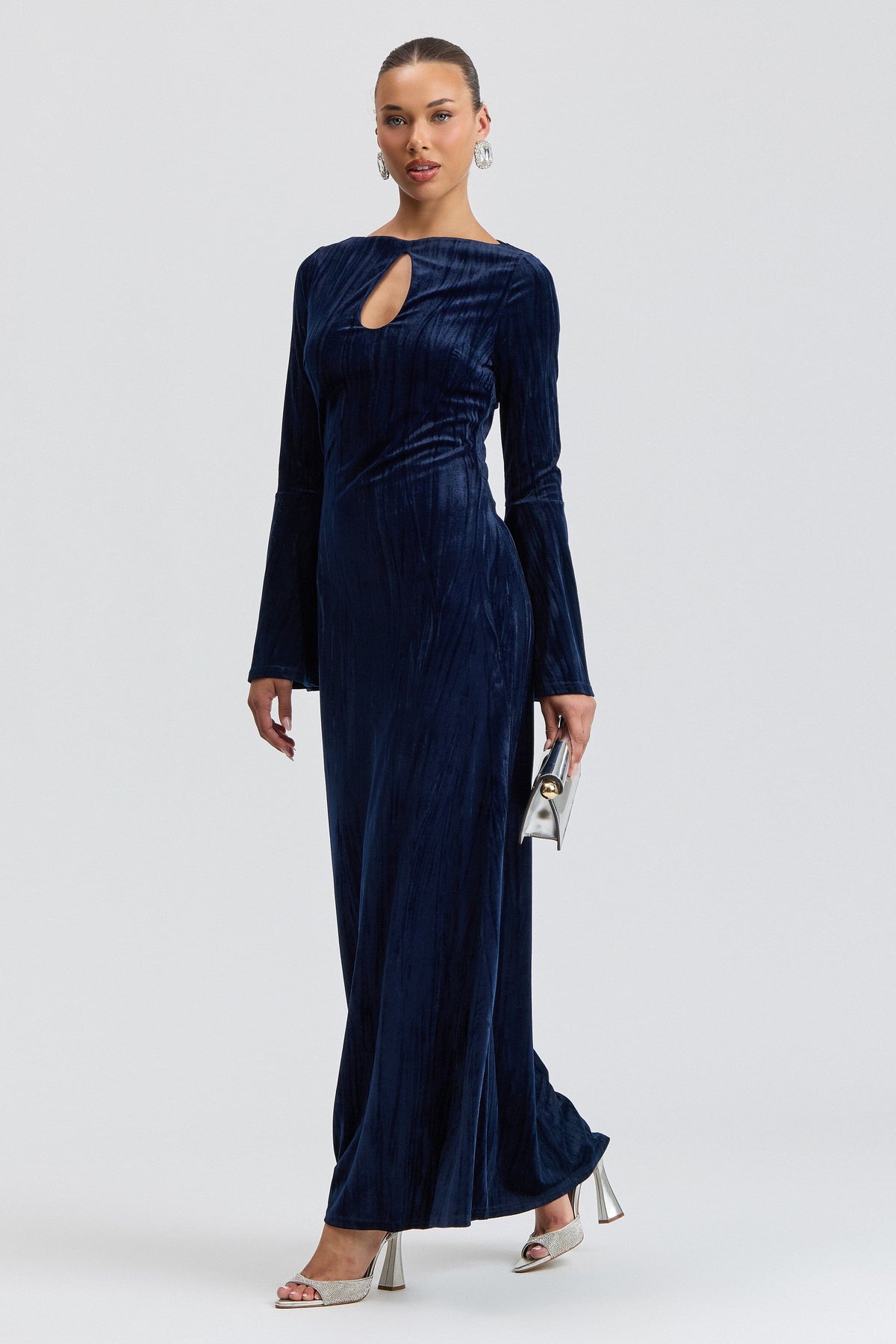Navy blue  long velvet dress with a keyhole neck. Shop women's cute velvet maxi dresses by Avec Les Filles.