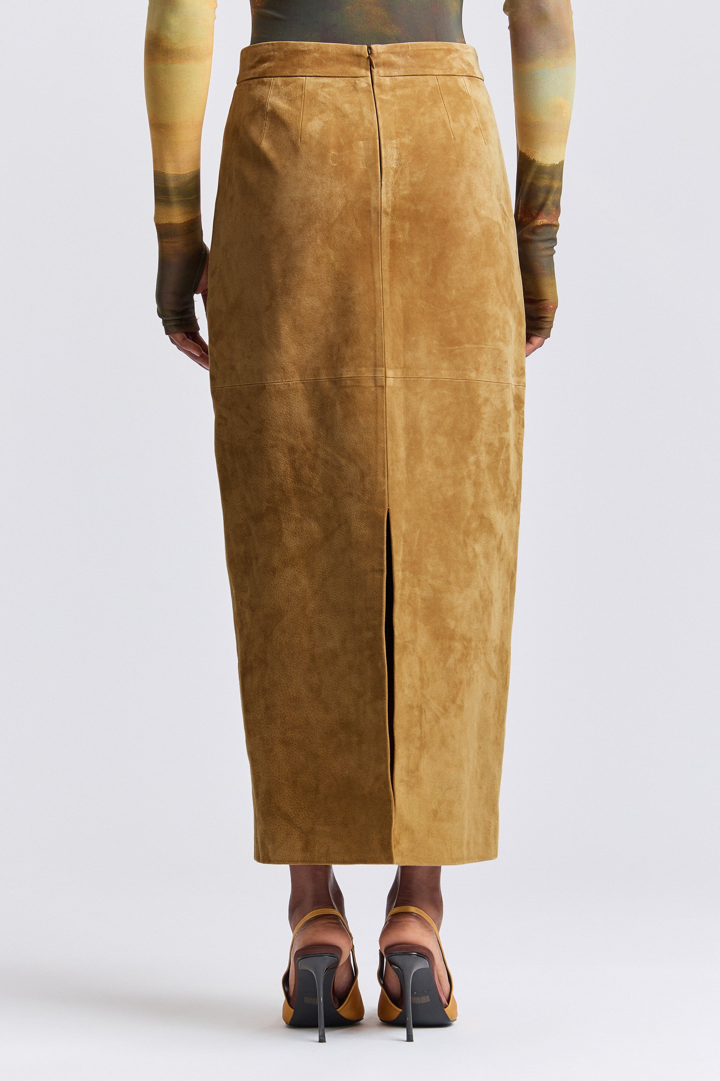 Brown fitted faux suede maxi skirt with a high waist and a back slit - Shop designer women's long maxi pencil skirts by Avec Les Filles.
