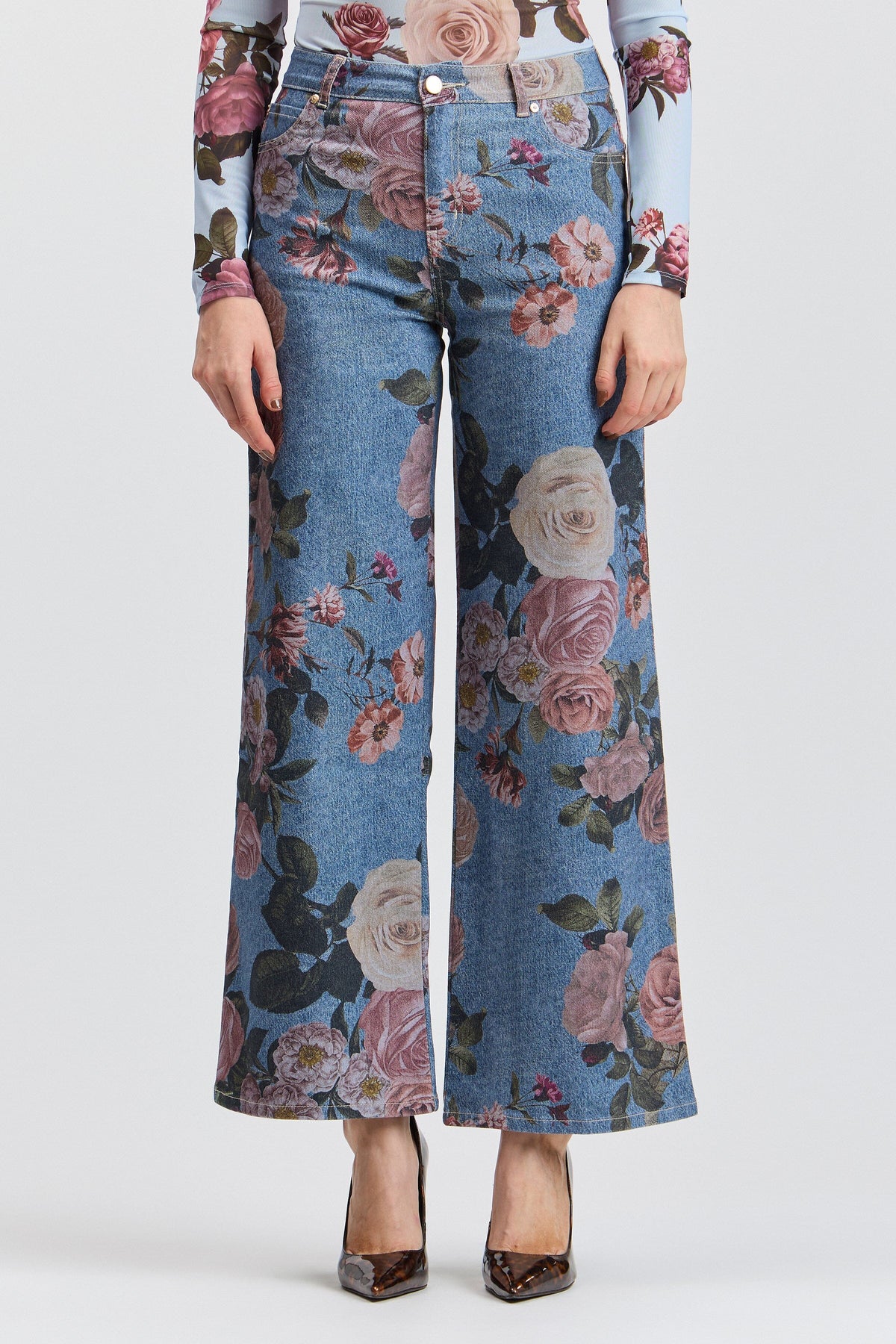 Blue denim flower jeans with a high-rise waist and pockets. Shop women's wide leg denim jeans by Avec Les Filles.