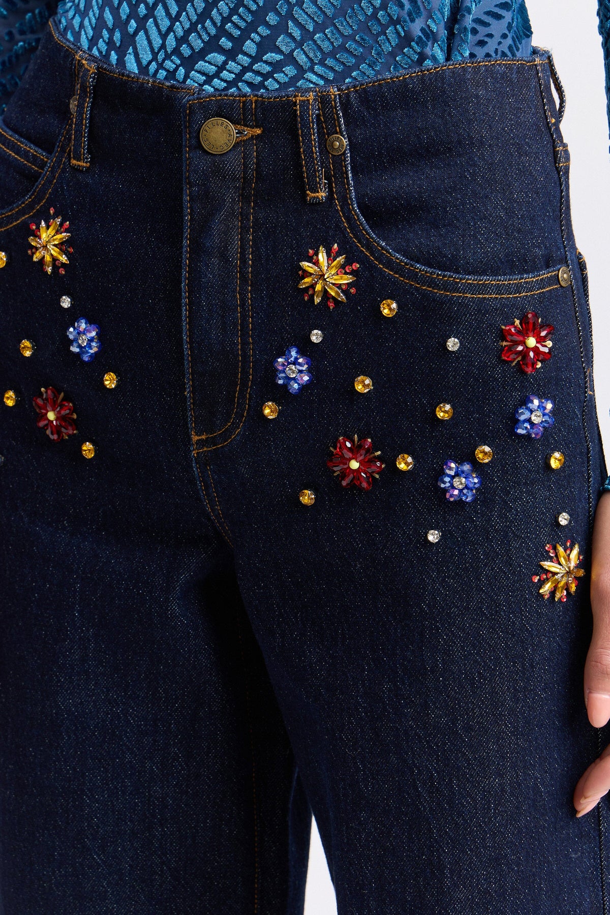 Stretch denim wide-leg jeans with rhinestone and pockets. Shop women's rhinestone jeans by Avec Les Filles.