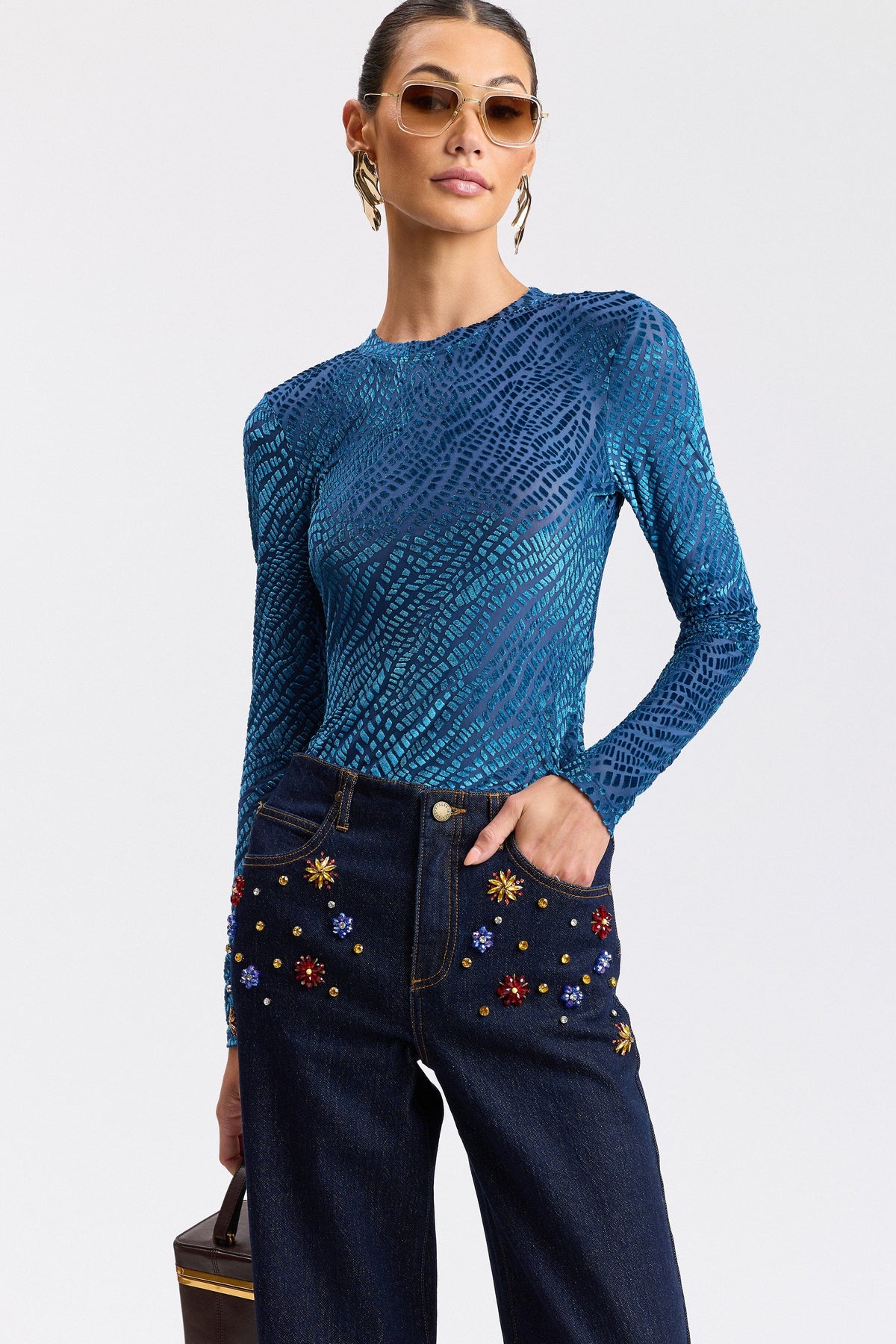 Stretch denim wide leg diamond studded with pockets. Shop women's rhinestone jeans by Avec Les Filles.