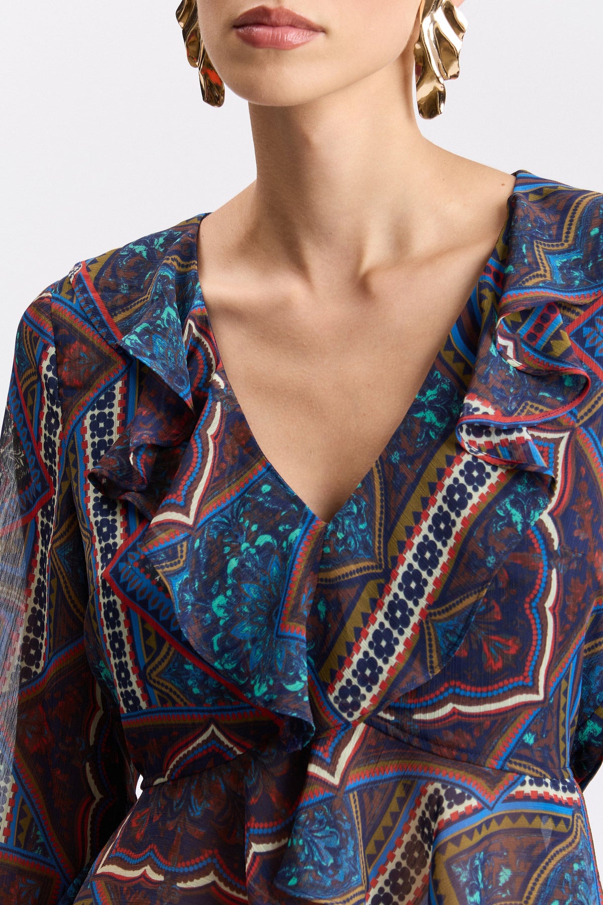 Printed crinkle chiffon ruffle multicolor peplum top with V-neck - Shop designer womens peplum tops by Avec Les Filles.