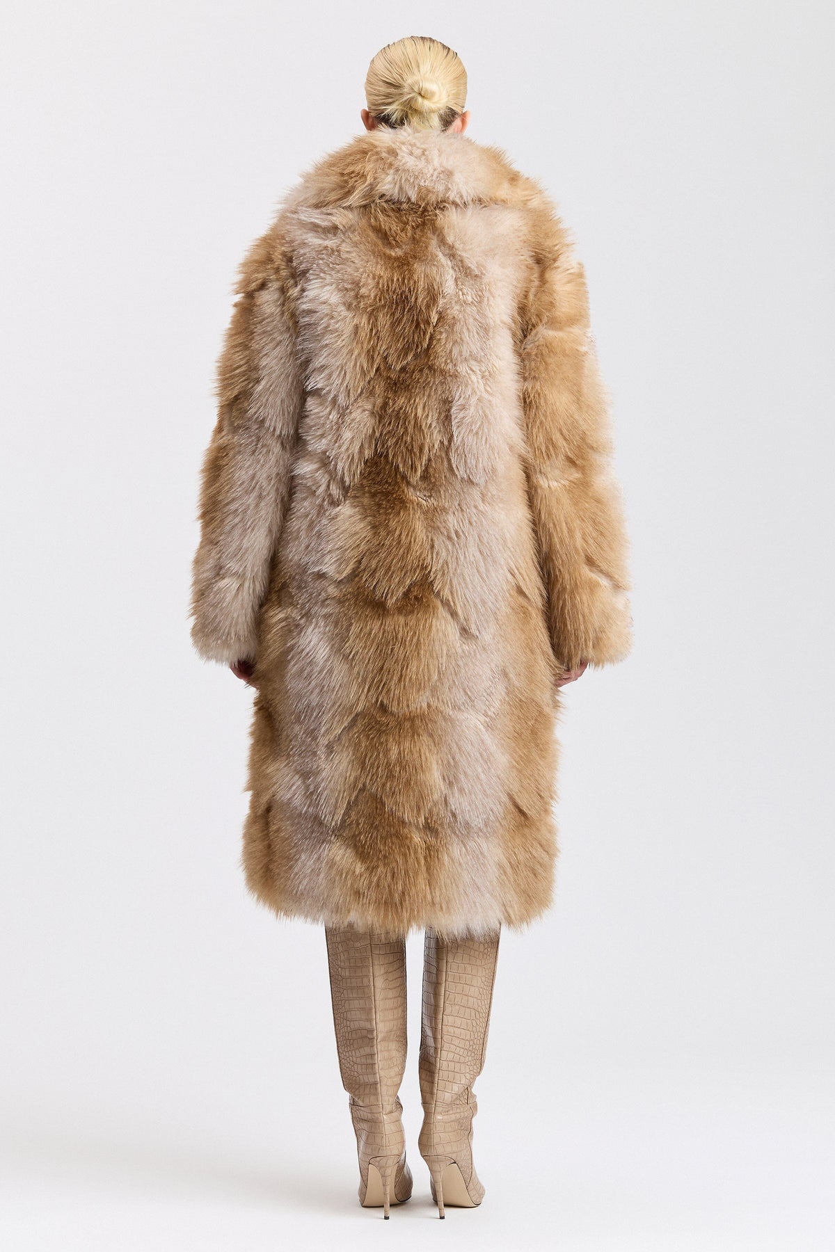 Beige fur jacket with wide collar and button front. Shop designer women's cute brown long coats by Avec Les Filles.