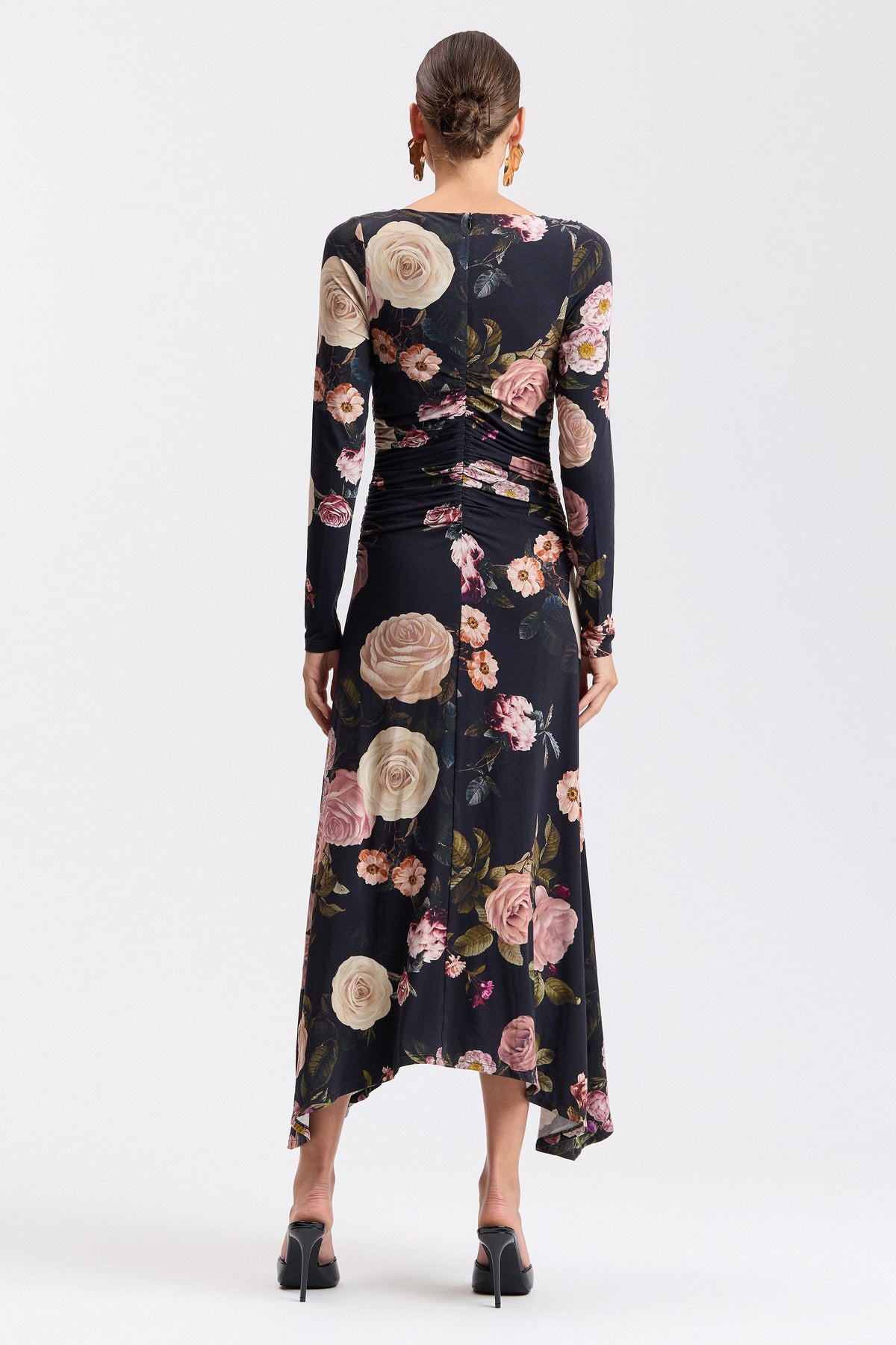 Shirred-shoulder black floral dress with a high-low hem. Shop women's cute midi dresses by Avec Les Filles.