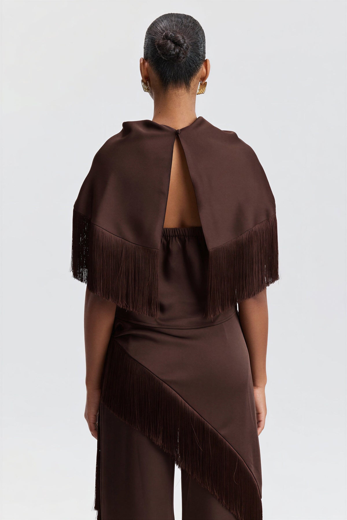 Satin scarf-neck halter fringe top with an asymmetric bandana-style cape. Shop brown tops for women by Avec Les Filles.
