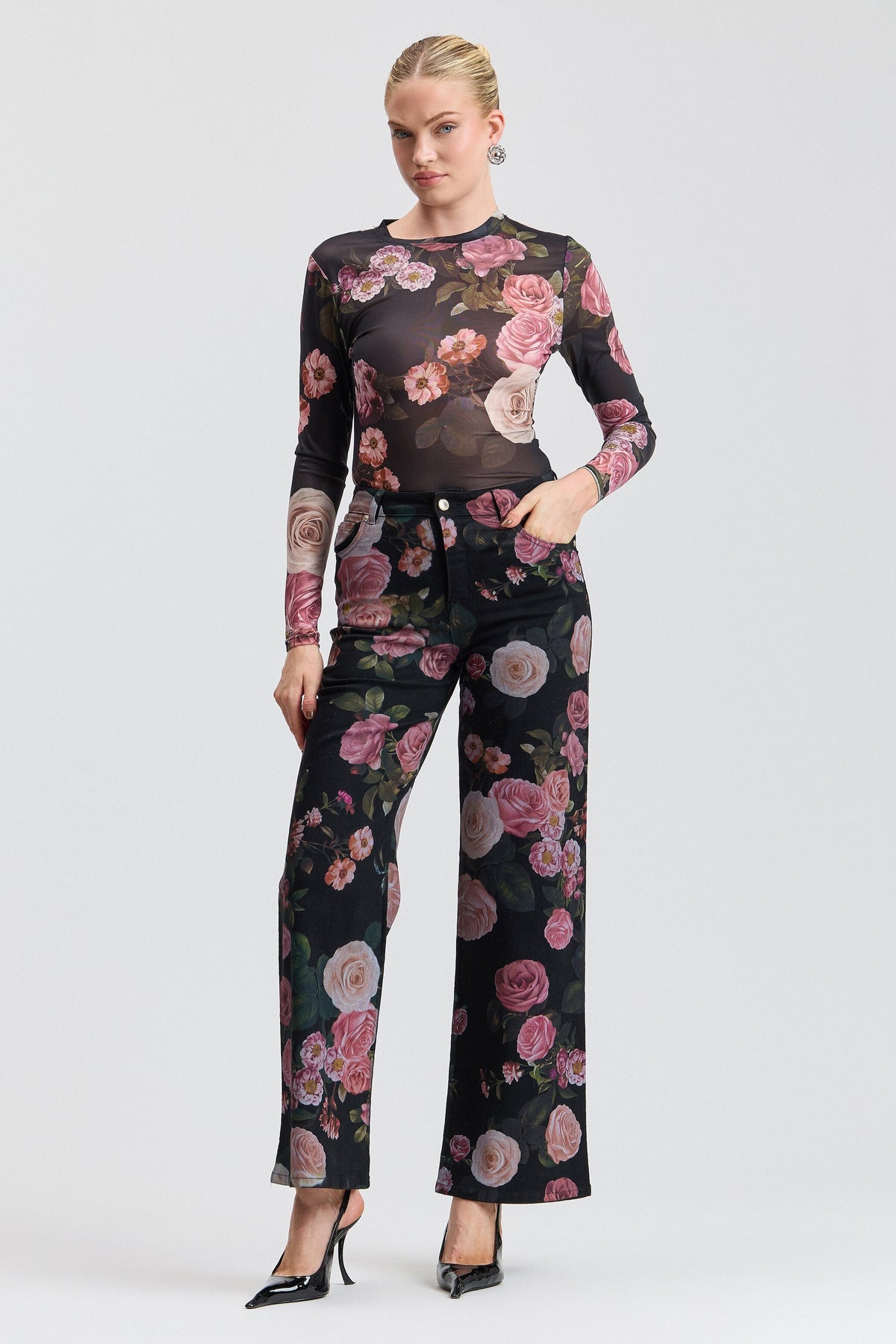 Black denim floral jeans with a high-rise waist and pockets. Shop women's wide leg denim jeans by Avec Les Filles.
