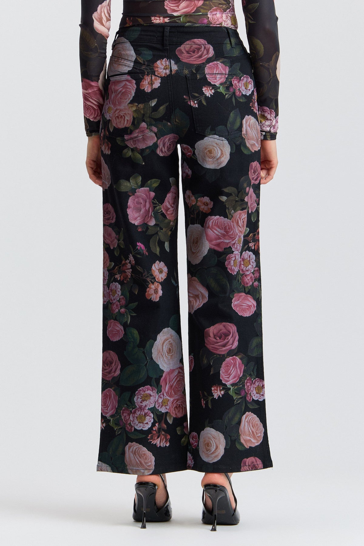Black floral women's wide leg denim with a high-rise waist. Shop designer women's wide leg denim jeans by Avec Les Filles.