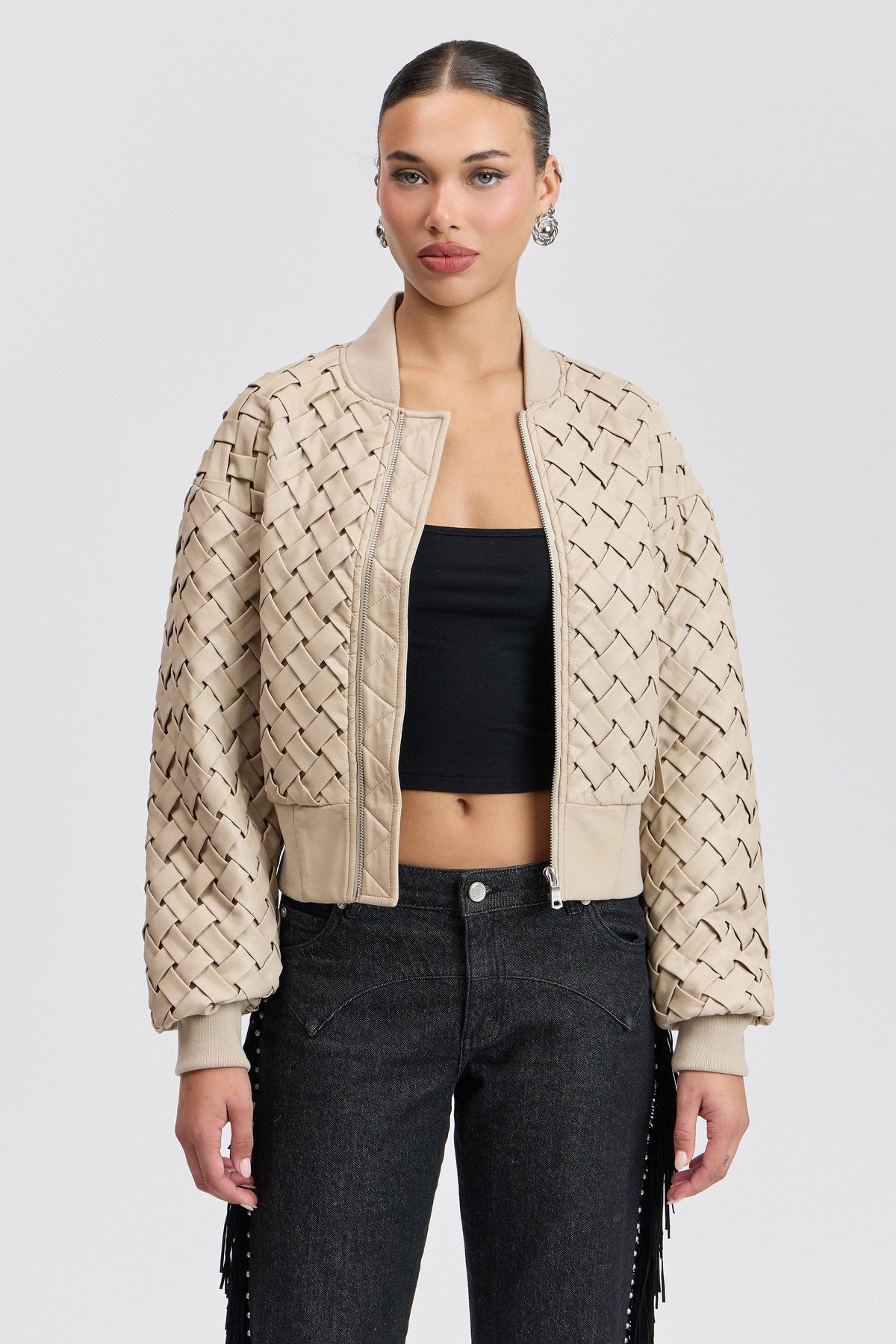 Cream faux leather bomber ladies witha rib-knit collar. Shop women's cute faux leather jackets by Avec Les Filles.