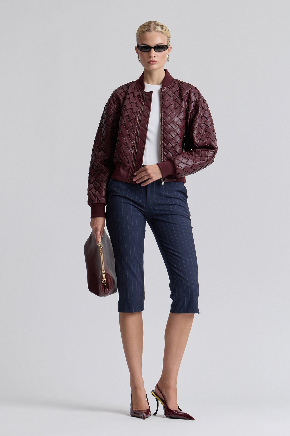 Woven red fake leather jacket with a zip front and long sleeves - Shop women's cute bomber jackets by Avec Les Filles.