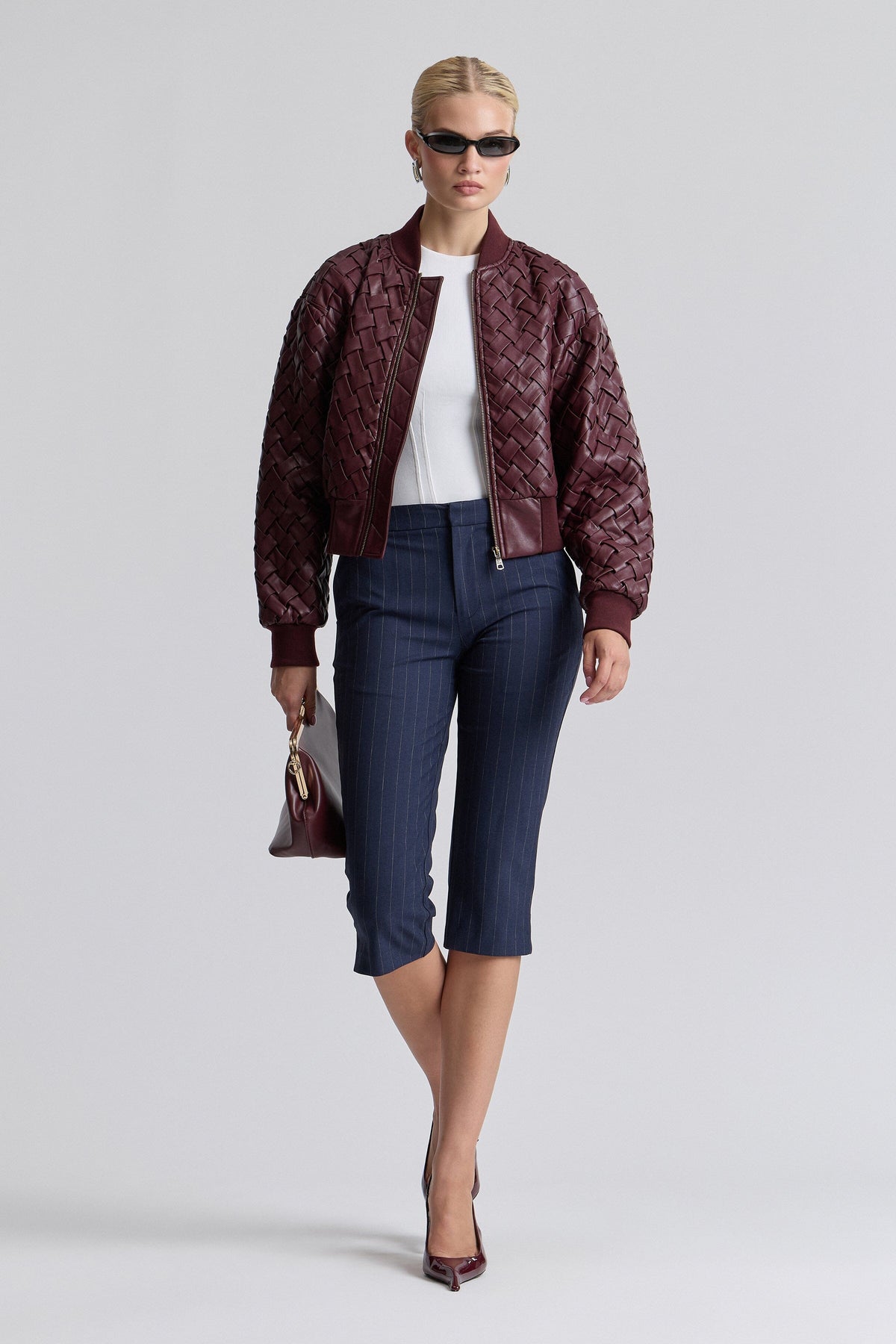Red faux leather jacket with a zip front, ribbed collar and long sleeves - Shop cute bomber jackets by Avec Les Filles.