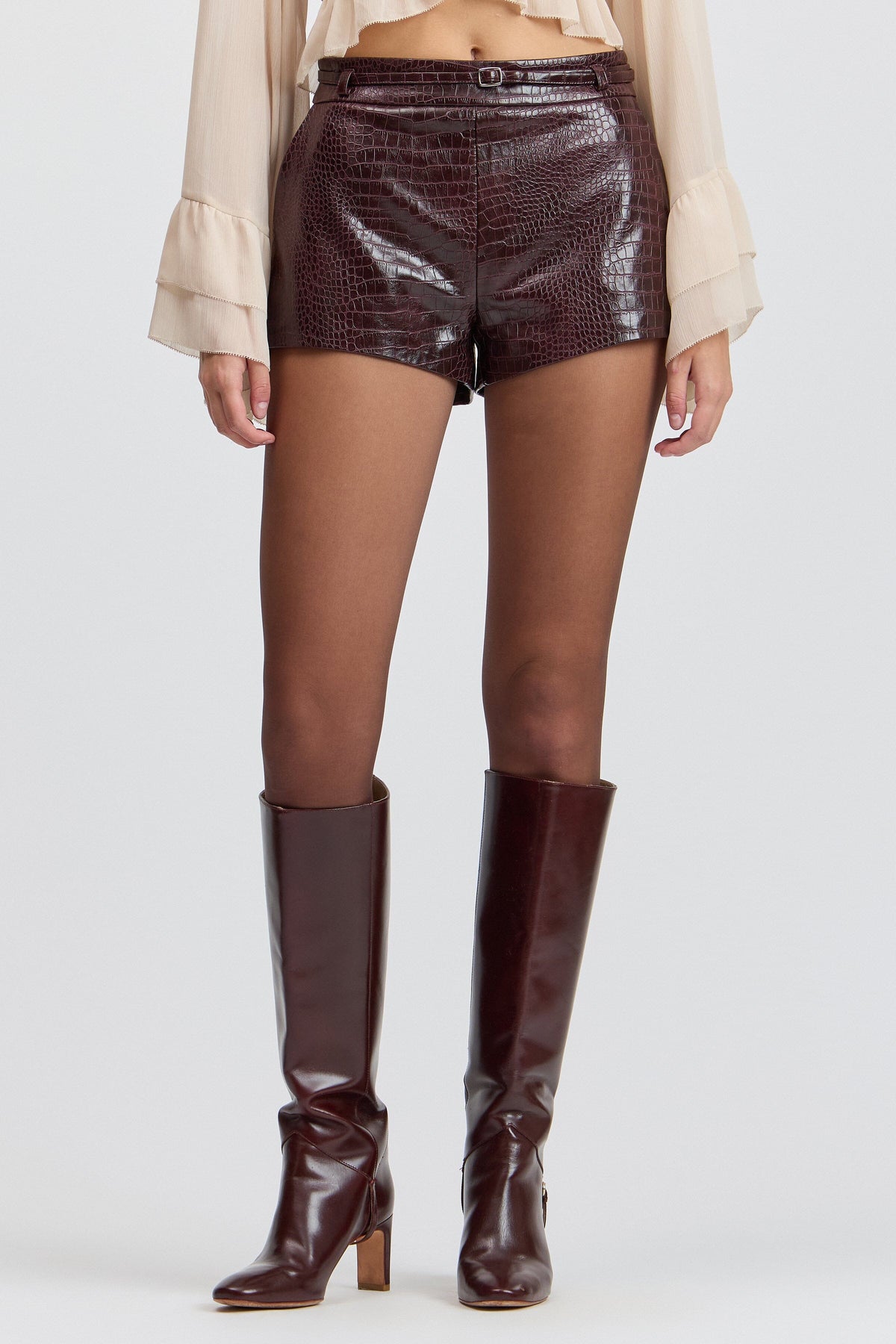 Croc-embossed leather shorts women with high-rise waist. Shop designer leather micro shorts by Avec Les Filles.