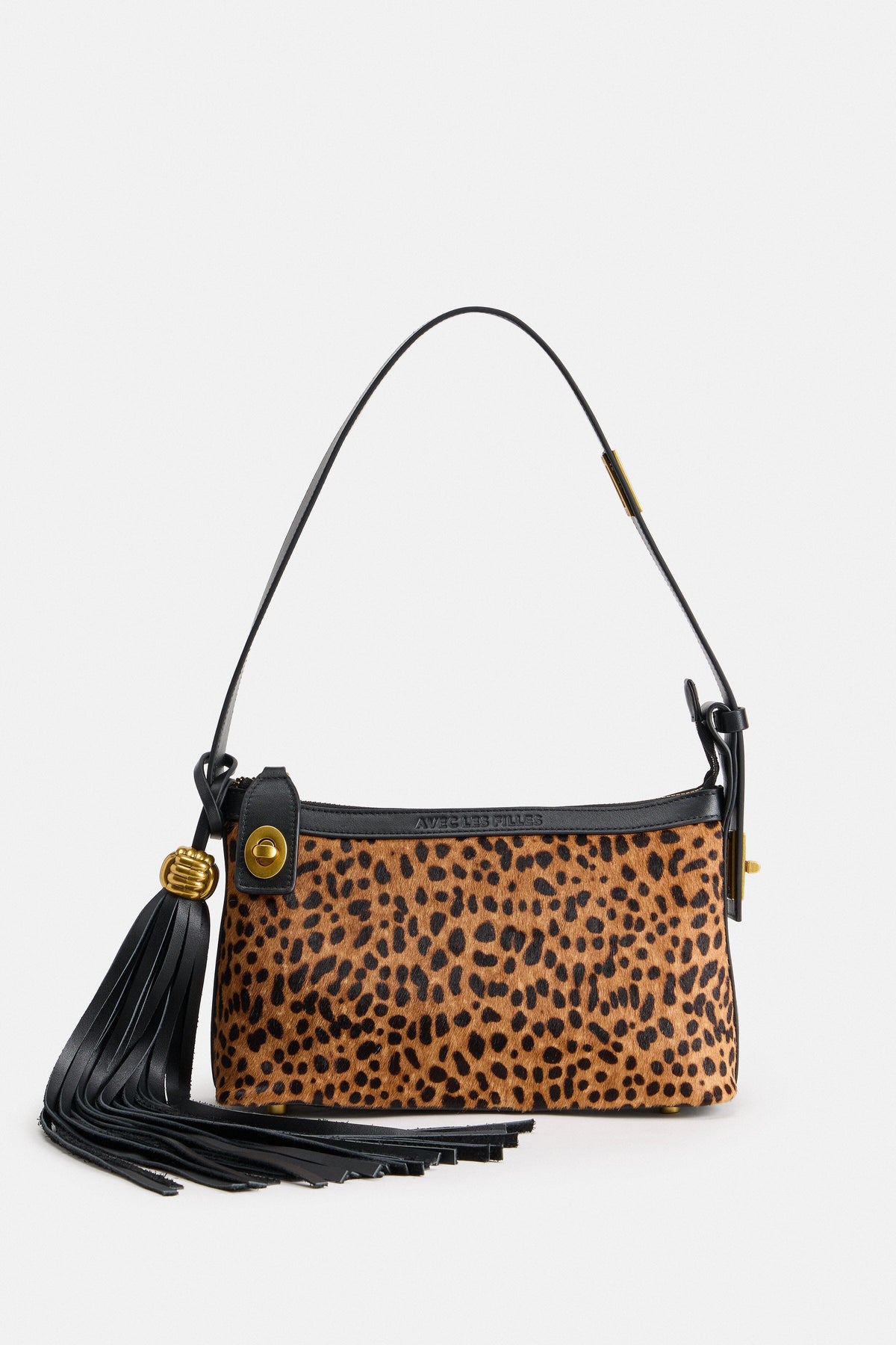 Cheetah print purse with adjustable leather shoulder strap - Shop women's leather handbags by Avec Les Filles.