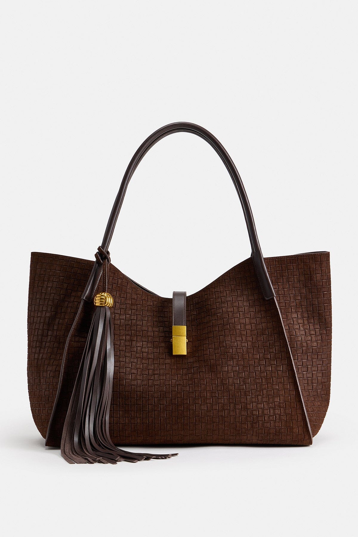 Brown woven shoulder bag is made of genuine leather with dual leather shoulder straps by Avec Les Filles.
