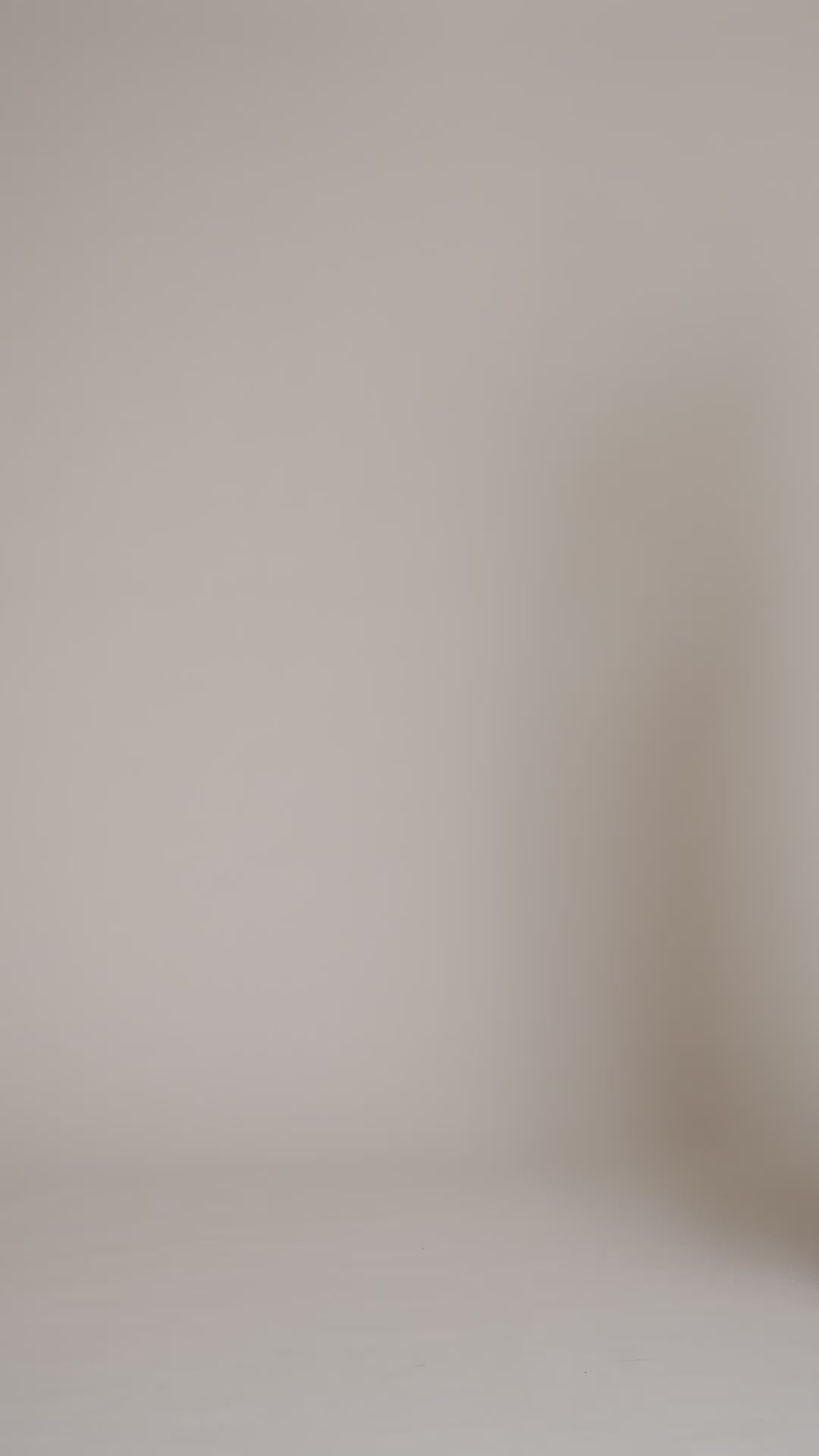 Striped faux mink fur brown button-front long coat with notched lapel collar and side flap pockets. Shop cute women's long fake fur coats by Avec Les Filles.