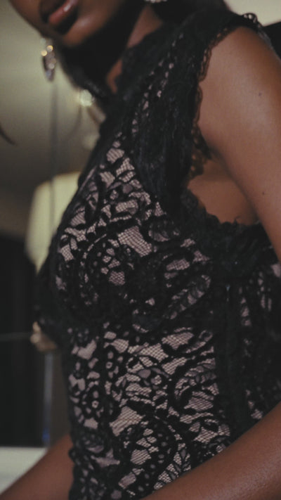 Sleeveless black lace maxi dress with a fitted fluted skirt. Shop designer women's cute black lace dresses by Avec Les Filles.
