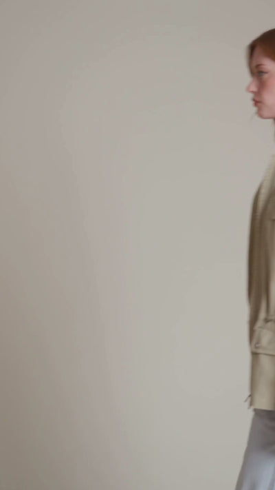 Cotton snap-front beige anorak jacket with long sleeves, attached hood and an adjustable drawstring waist - Shop designer jackets by Avec Les Filles